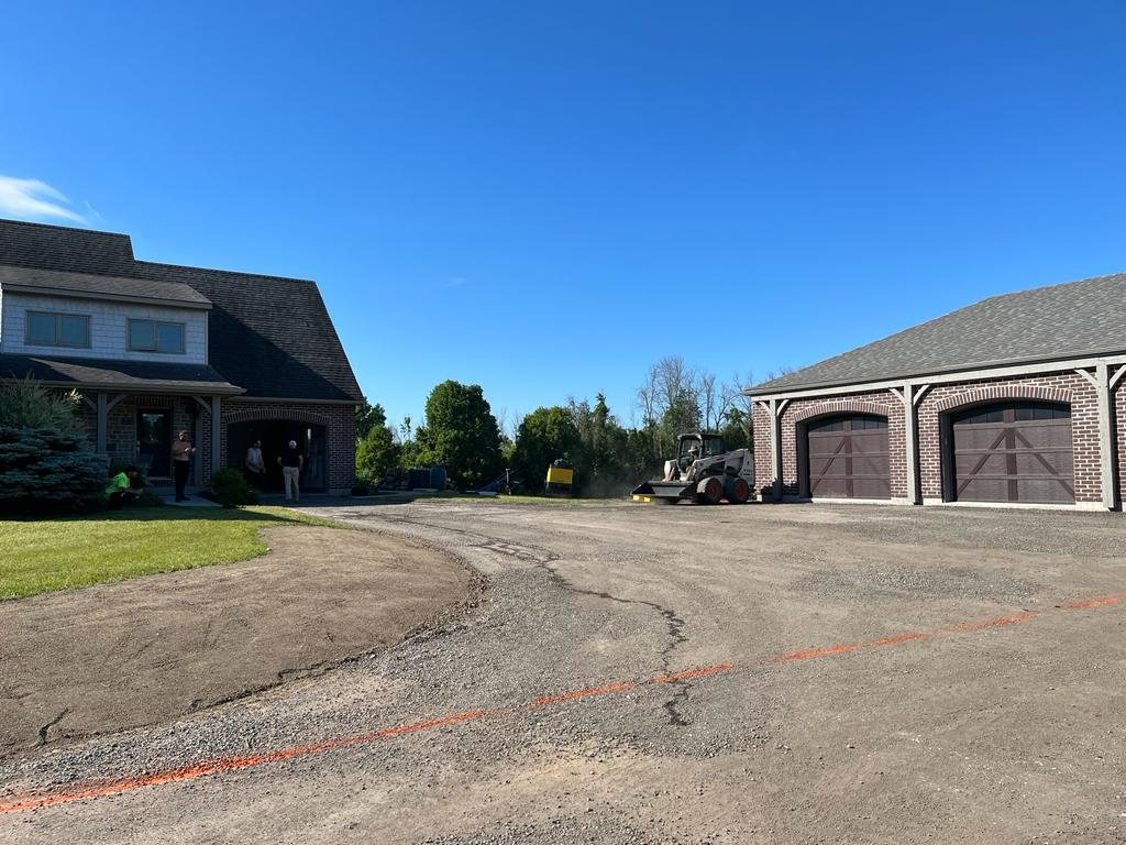 Genesis Paving preparing a residential driveway