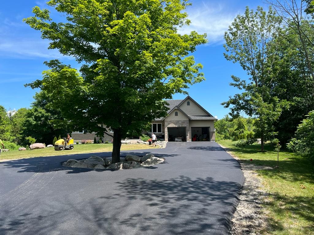 freshly paved asphalt driveway