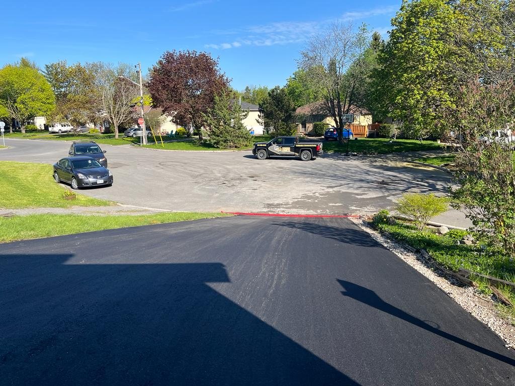 Genesis team finishing up with a residential driveway