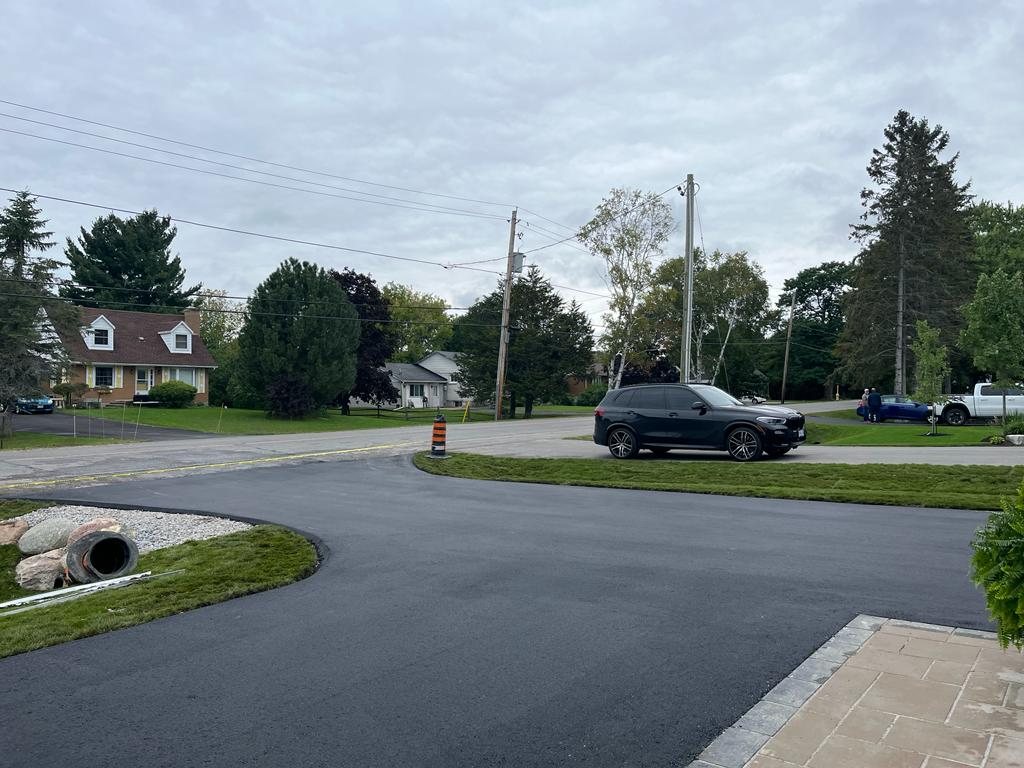 freshly paved driveway and road