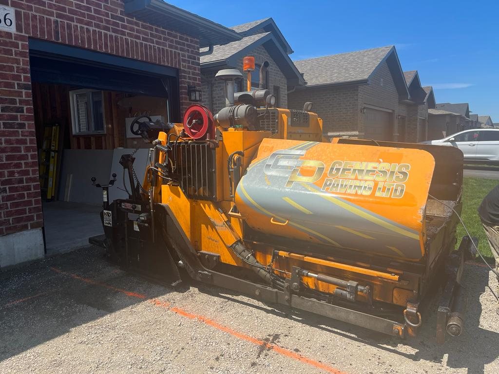 Genesis Paving equipment being prepared to start work on a residential driveway