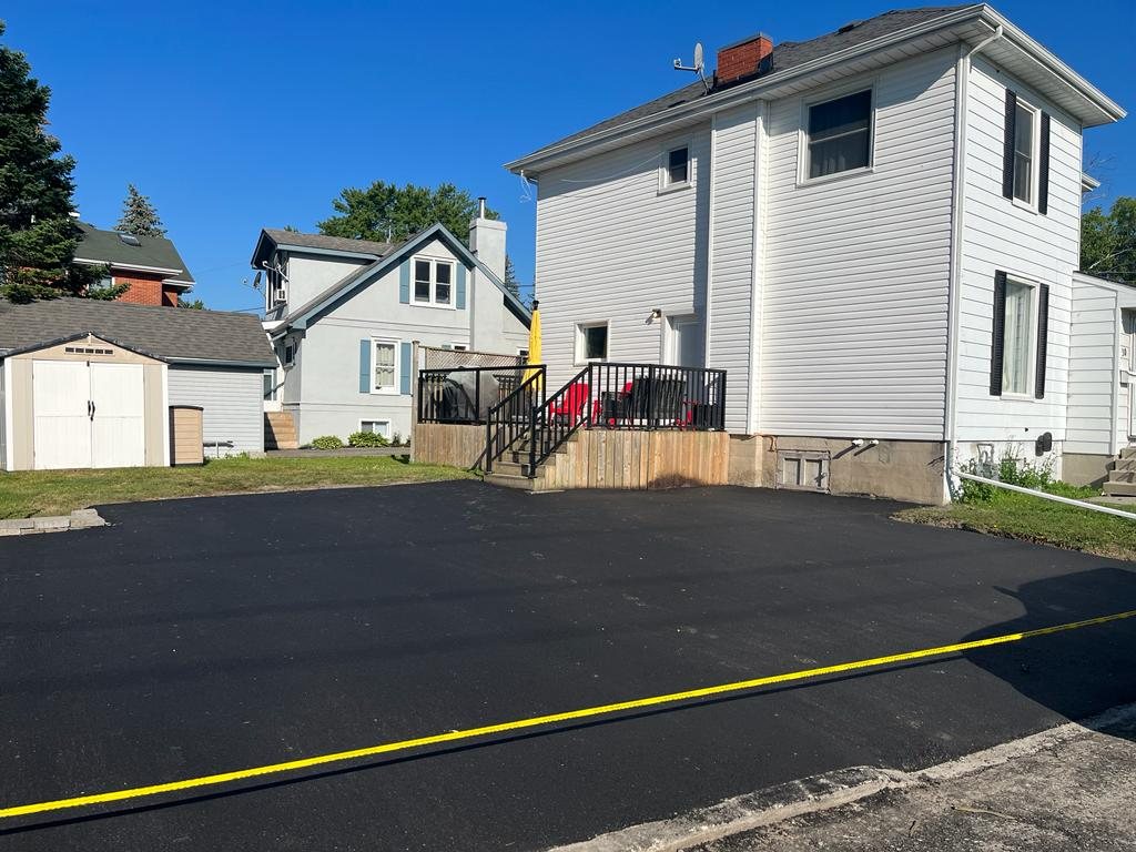 freshly paved parking lot addition