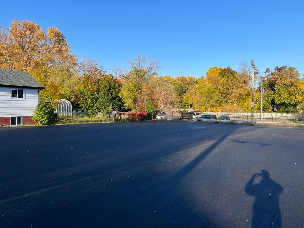 freshly paved parking lot addition