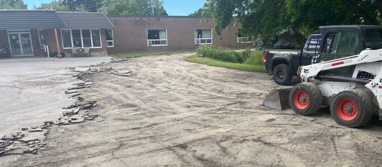 excavation of old pavement to make way for new asphalt paving